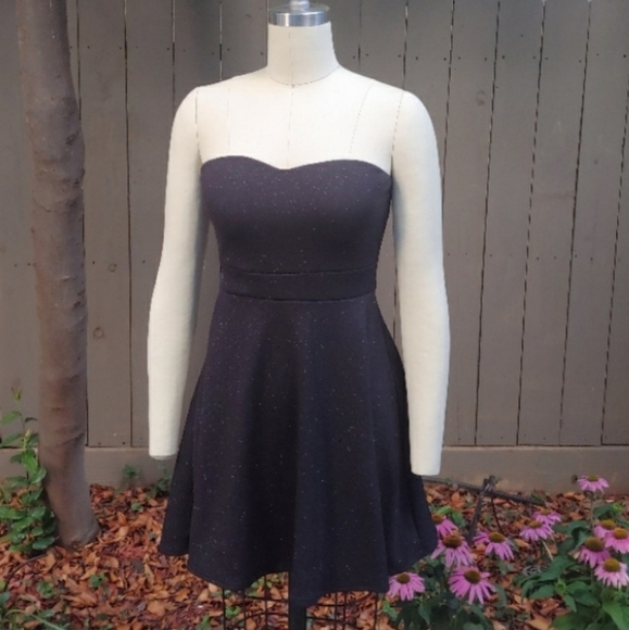 Wet Seal Dresses & Skirts - Wet Seal Sparkly Black Strapless Bow Back Dress M